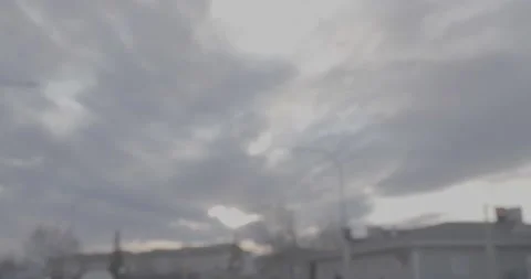 Trippy blurred driving looking at the evening sun Stock Footage 146807618