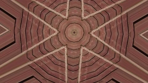 A trippy pattern spinning in a abstract brown Kaleidoscope. Stock Footage 154627693