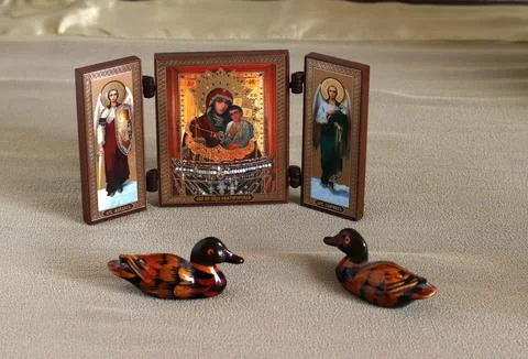 Triptych - an icon with the trinity of the most powerful saints of Orthodoxy. Stock Photos