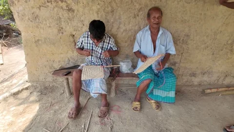 Tripura tribe men using bamboo fans, Row... | Stock Video | Pond5
