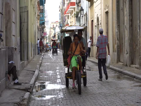 Trishaw on a street Stock Footage 70817232
