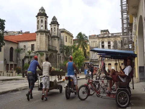 Trishaw without passenger are parked on central touristic street near square Stock Footage 70853071