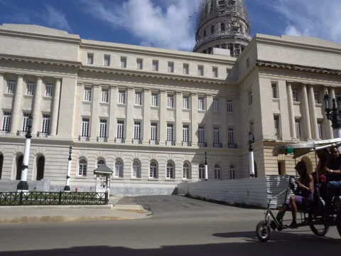 Trishaws behind the Capitol Stock Footage 70952238
