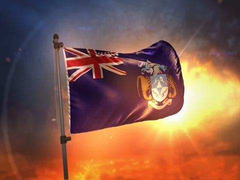 Tristan da Cunha Flag Backlit At Beautiful Sunrise Loop Slow Motion 4K Stock Footage 76886259
