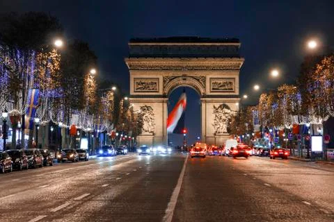 Triumph arc, Arc de Triomphe in French,  place at the blue hours crowded with Stock-Fotos