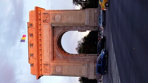 Triumphal arch and flag at sunset red light and purple sky Stock Footage 112873496