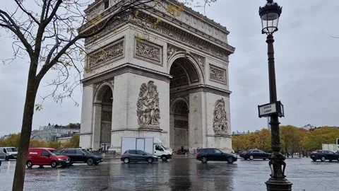Triumphal Arch (Arc de triomphe) in Paris, France. Rainy autumn day with a view  Stock Footage 222552831
