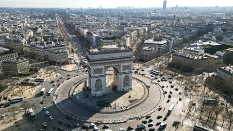 Triumphal arch or Arc de Triomphe and car traffic on roundabout with Paris Stock Footage 265465484