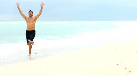 Triumphant Finish on the Beach Stock Footage 33577815
