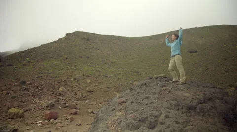 Triumphant hiker Stock Footage 59510636