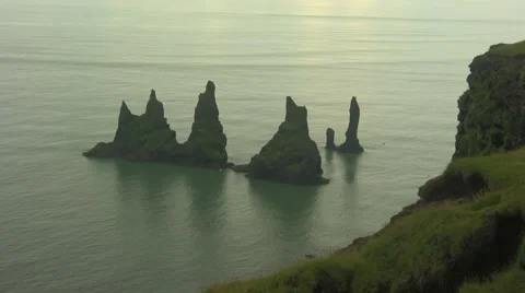 Troll Rocks in calm sea at Vik Iceland-6 high shot Video stock 47765312