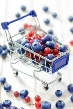 Trolley with berry Stock Photos