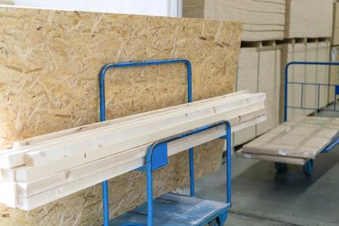 Trolley in a hardware store with building materials. Warehouse large storage Fotos de archivo