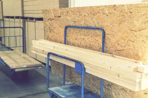 Trolley in a hardware store with building materials. Warehouse large storage Fotos de archivo
