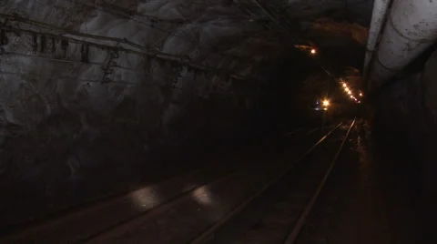 Trolley in the mine goes on rails  Stock Footage 61749563
