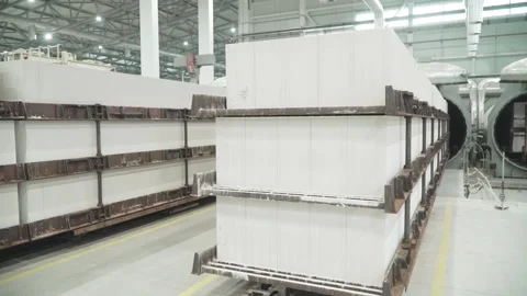 A trolley with a stack of dried aerated concrete blocks Stock Footage 312619182