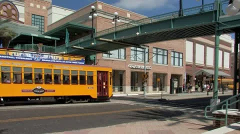 Trolley stops at Centro YBOR city in Tampa Stock Footage