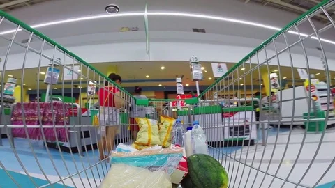 Trolley in a supermarket  Stock Footage 75569464