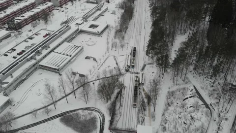 Trolley Trains, Snow Covered Platform, Winter Commuting, Top Down, Aerial Stock Footage 150102319