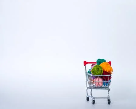 Trolley with yarn for knitting. Needlework. Hobbies and recreation. Colored t Stock Photos