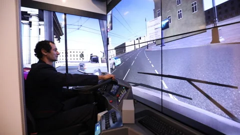 Trolleybus driver in the trolley simulator Video stock 94225455