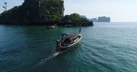 Trolling rods set on a longtail among karst islands Видео 71301363