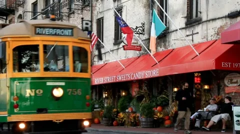 Trolly Driving by a Candy Shop Stock Footage 8909836