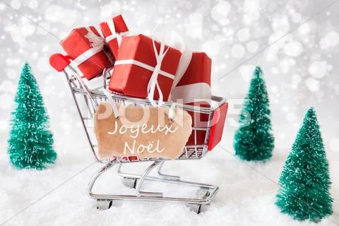 Trolly With Gifts, Joyeux Noel Means Merry Christmas Stock Photos