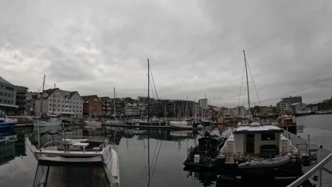Tromso inner harbor marina with docked yachts boats and waterfront buildings Vidéo 341697359