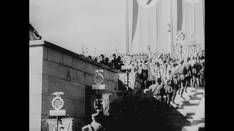 Troop engage in formations and parades as Hitler arrives - 1934-1940 Stock Footage 83833612