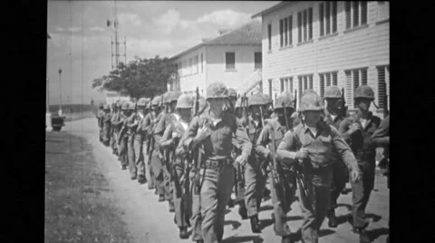 Troop of soldiers marching on road Stock Footage 37591965