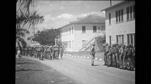 Troop of soldiers marching while other troops watching them Stock Footage 37591971