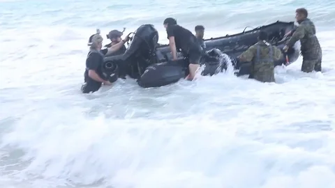 Troops in a Combat Rubber Raiding Craft co Stock Footage 116614737