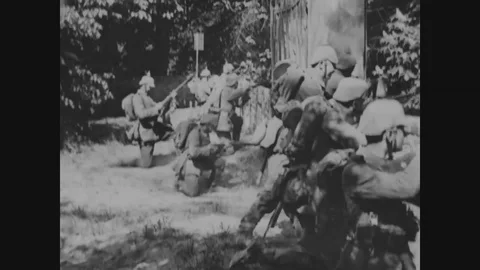 Troops fire rifles and Russian prisoners of war are shown and wounded soldiers Stock Footage 107739699