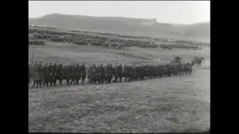 Troops march on a field and General John Pershing decorates soldiers during Stock Footage 106033593