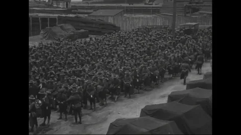 Troops marching towards ship at Newport News harbor, Virginia - 1918 Stock Footage 83660470