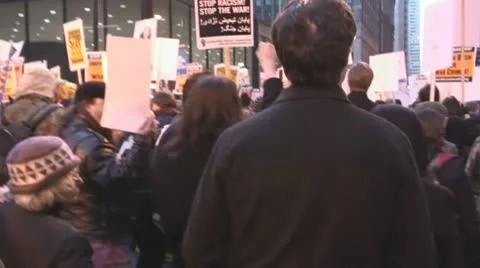'Troops out now!' - Iraq War protest march Stock Footage 10683397