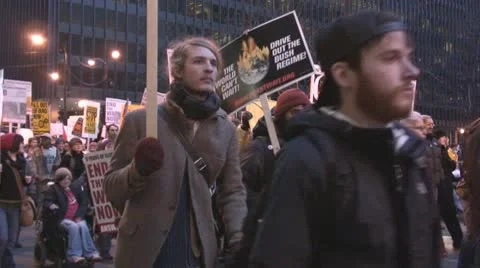 'Troops out now!' - Iraq War protest march Stock Footage 10683415