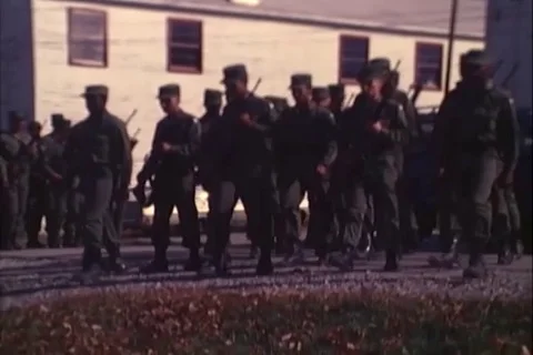 Troops at port arms marching in formation - 1980 Stock Footage 106052451