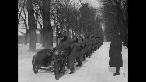 Troops rides motorcycles in snow during winter Stock Footage 83413229