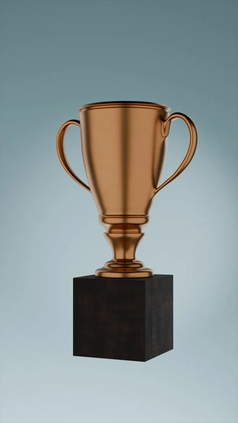 Trophy Illuminated in Spot light With Soft Blue Background Stock Footage 317693894