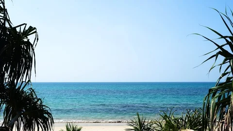 Tropical beach afternoon view,  of waves break on tropical white sand beach. 스톡 동영상 110738036