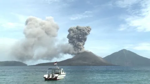 Tropical Beach And Erupting Volcano Stock Footage