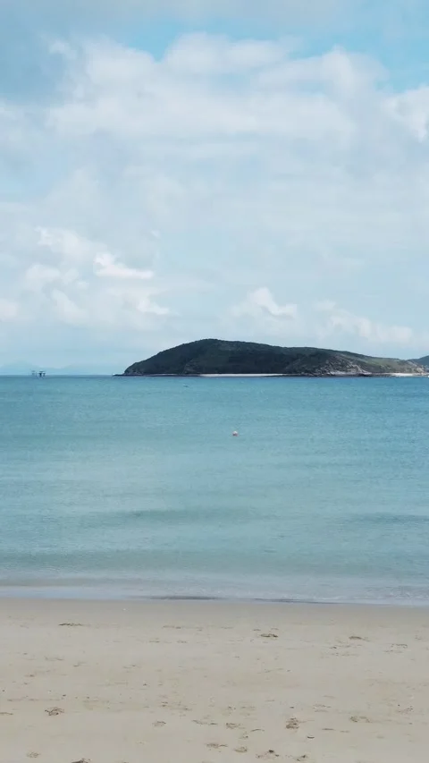 Tropical beach in Australia. Sandy beach and blue transparent ocean. Aerial view Stock Footage 276875598