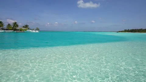 Tropical beach. Beautiful Water Surface Moving Up Waving. Clear Blue Water Stock Footage 193084789