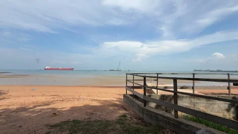 Tropical Beach Coastline with Cargo Ship in Port Dickson Malaysia Stock Footage 340484768