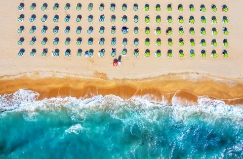 Tropical beach with colorful umbrellas. Picture with drone! Stock Photos