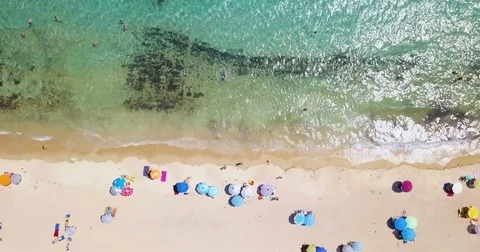 Tropical beach full of people Stock Footage 78730369