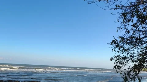 Tropical Beach Landscape with Blue Sky and Ocean Waves Stock Footage 340338688