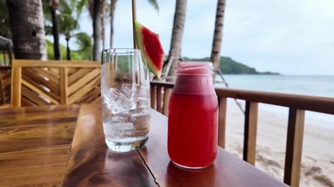 Tropical Beach Refreshment   Iced Watermelon Juice Stock Footage 264810492